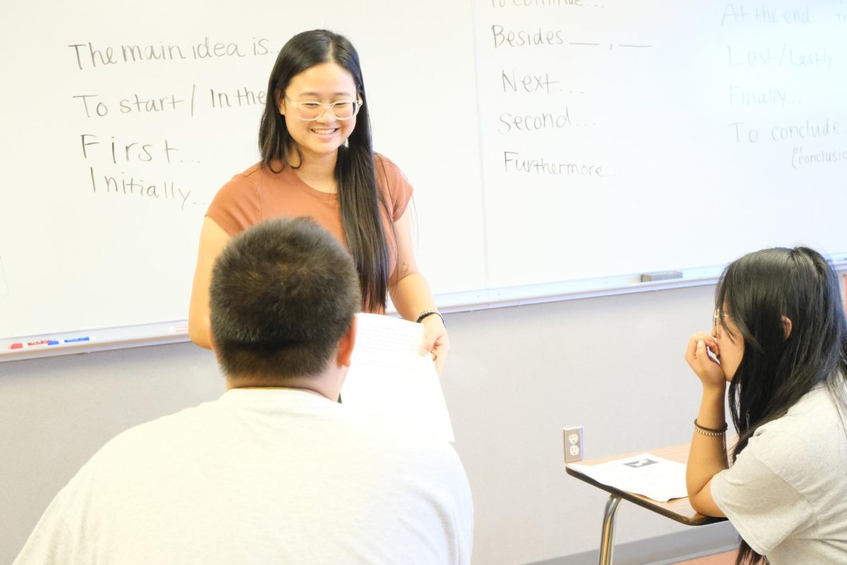 Ms.Tien interacting with her students.