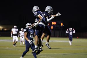 First Quarter Touchdown Celebration featuring Peter Ruiz (10) and Tyler Bernardo (12)