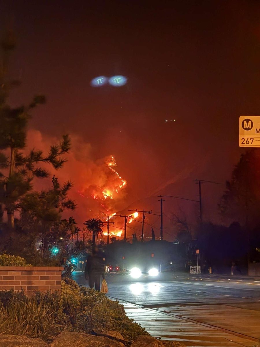 EMERGENCY EVACUATION - Arcadia citizens evacuate their homes as the Eaton Fire gradually approaches them. 