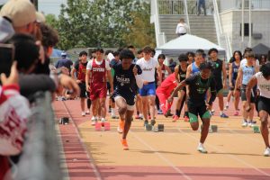 Ajani Romero warms up at the Arcadia Track Meet. 