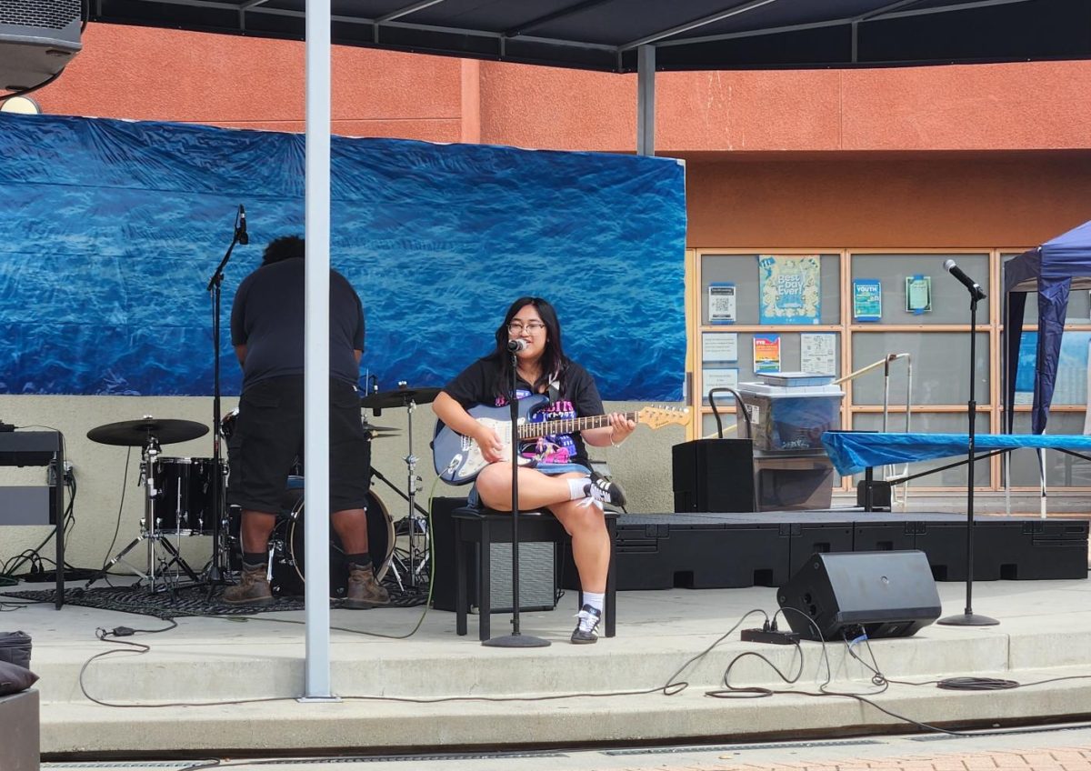 A student performs an individual piece for the crowd.