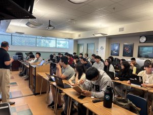 Math teacher Jorge Salas instructs students in his classroom.