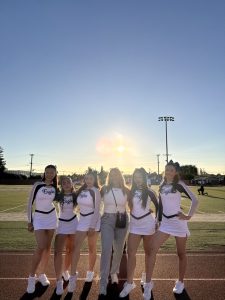 Song team poses at Varsity football game against Azusa (Left to right; Keira Trang, Amy Yuan, Gianna Castro, Ava Diaz, Samantha Muro). 