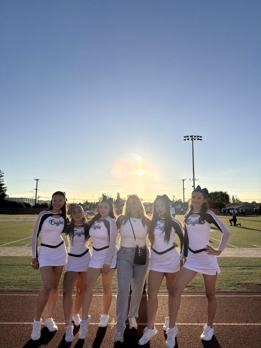 Song team poses at Varsity football game against Azusa (Left to right; Keira Trang, Amy Yuan, Gianna Castro, Ava Diaz, Samantha Muro). 
