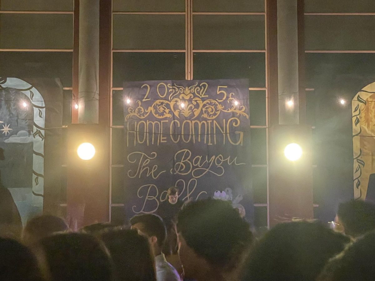 Colorful lights and themed posters set the scene at the Homecoming Dance.