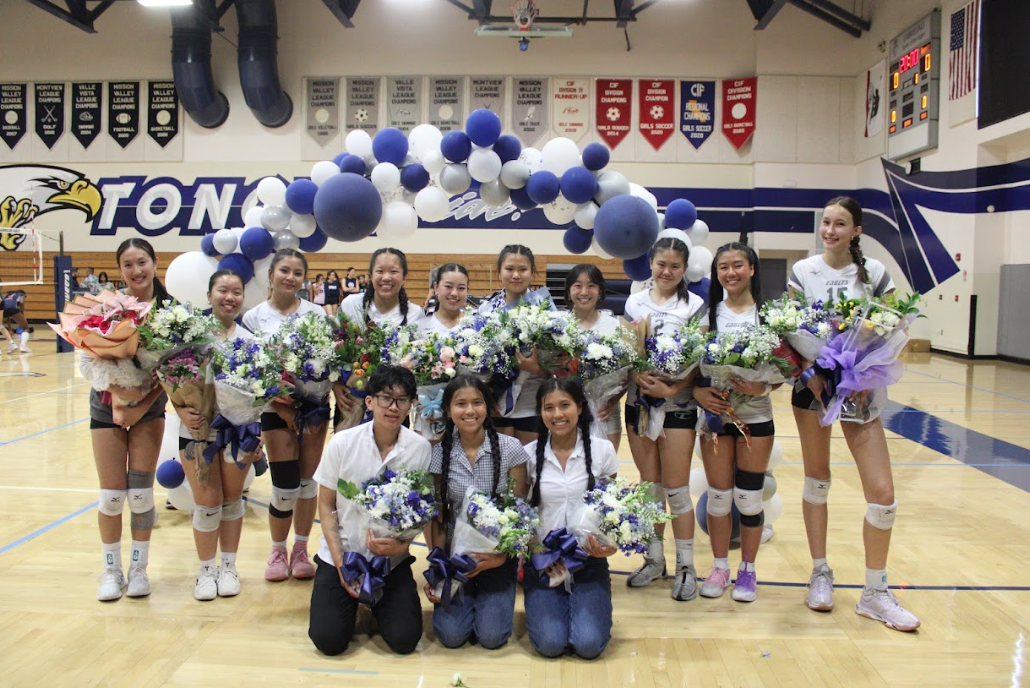 Girls varsity volleyball team seniors pose before final home game against Marshall (Left to right: Samantha Cheung, Kellie Chen, Kelly Rosales, Kacie Nguyen, Kiri Hoard, Janna Concepcion, Jocelyn Chau, Miley Hy, Jennifer Quach, Audrey Ko, Jaeden Tieu, Persephane Hoang, Peonie Hoang)