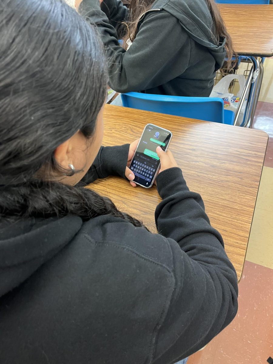 Junior Andrea Cuevas sending her daily morning text message to her mom, a small routine that reminds her to stay grateful and grounded.