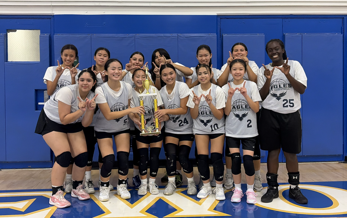 Gabrielino's girls basketball team posing with their first tournament trophy of their preseason from Edgewood's 5th Annual Lady Lions Classic.