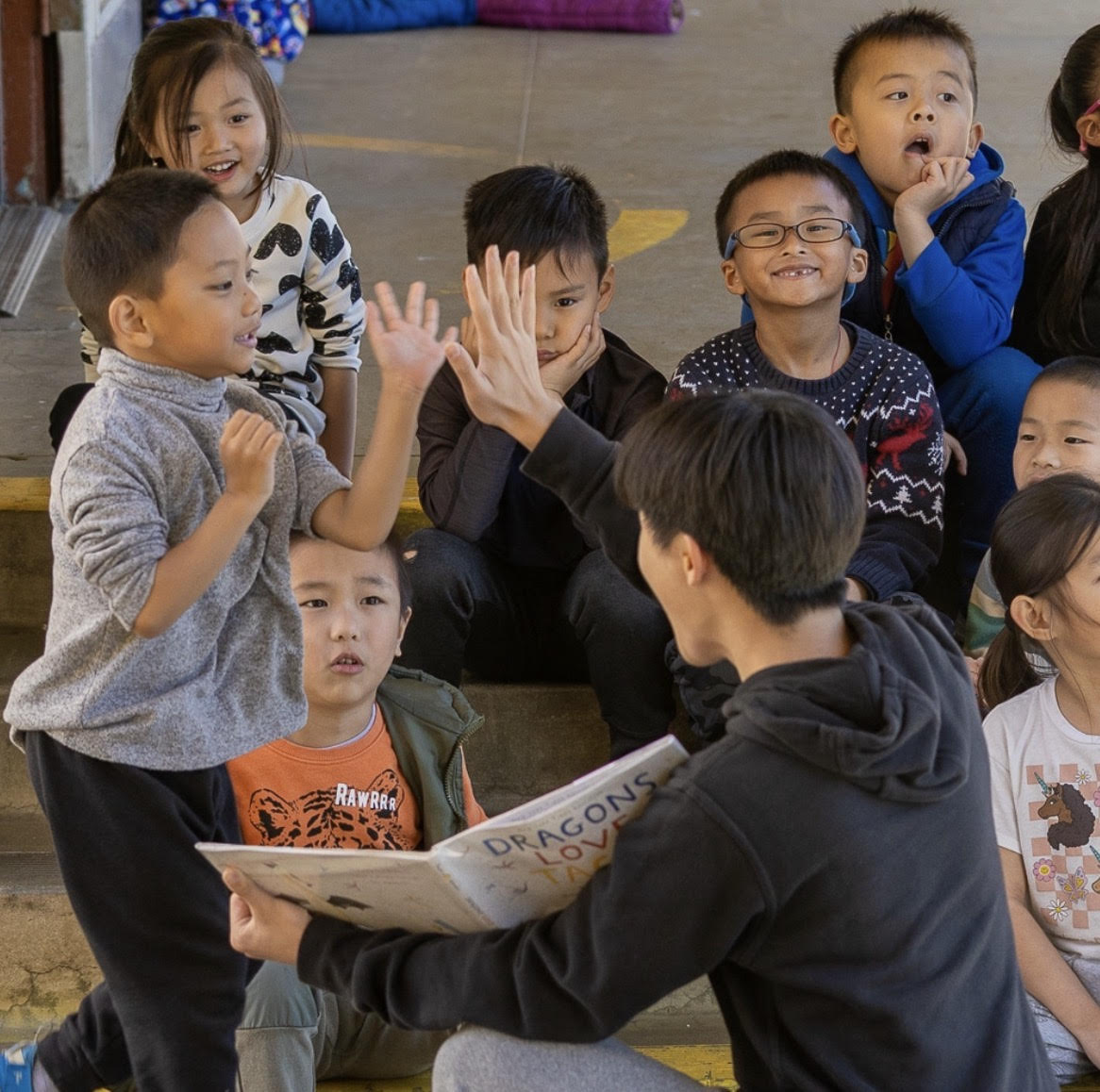 Gabrielino students read as McKinley students listen. 