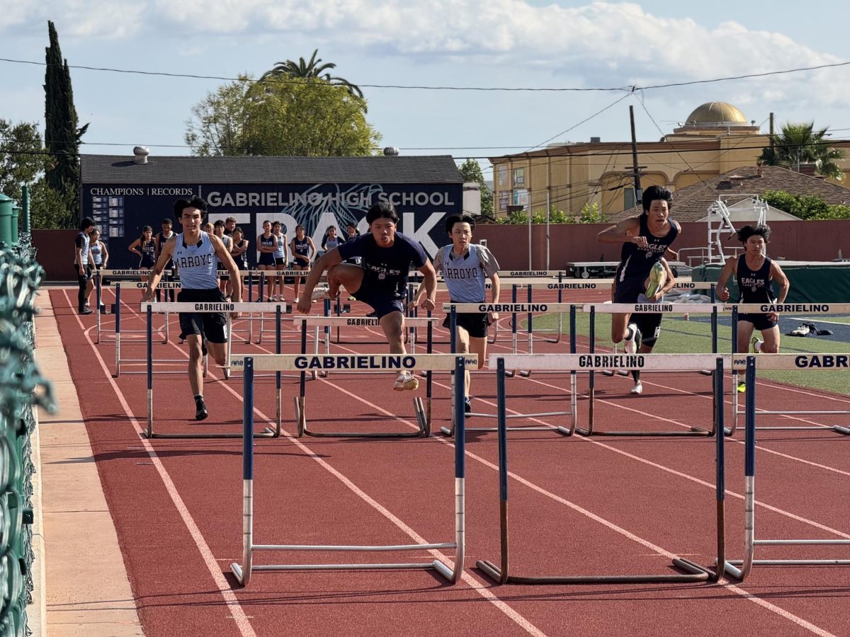 Gabrielino's varsity hurdlers surge forward in the 110 meter hurdle race 